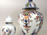 two vases that are sitting next to each other