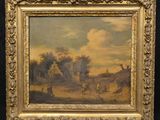 a painting of a village scene with a man and a dog in the foreground