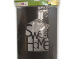 un paquet de papier toilette avec un autocollant sur lequel est écrit « Sweet Home »