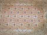 an image of a large oriental rug on a wooden floor