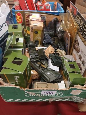 a box full of assorted toys on a table