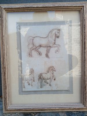 dessin encadré représentant un cheval et son poulain, dans un cadre en bois