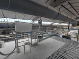 a view of a factory with a lot of pipes and pipes