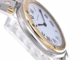 a silver and gold wrist watch with a white face
