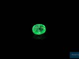 a green diamond on a black background