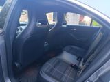 the back seats of a car with a seat belt in a car