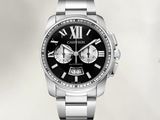 a close up of a watch with roman numerals on the face