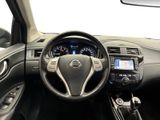 the interior of a car with a steering wheel, dashboard, and dash board