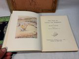 a book opened to show a picture of a little boy
