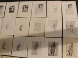 a lot of drawings that are on the table
