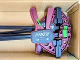 a box that has a pair of clamps in it