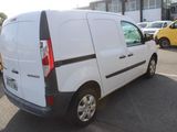 a white van that is parked in a parking lot