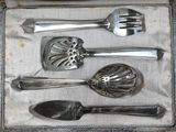 a box with a set of silverware in it