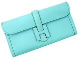 a blue leather wallet with a metal clasp on the front