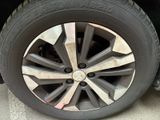 a close up of a tire on a vehicle