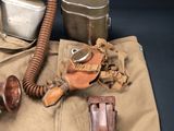 a gas mask and other items on the table