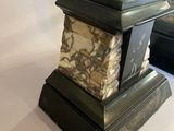 a clock that is sitting on top of a table
