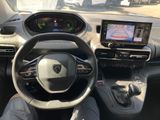 the interior of a car with a steering wheel, dashboard, and dash board