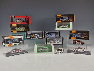 many different models of cars in a display case