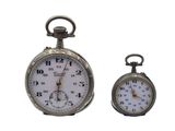 two clocks sitting side by side on a white background