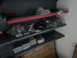 a shelf with many items on it in a room