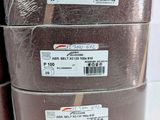 three rolls of brown tape are stacked on top of each other