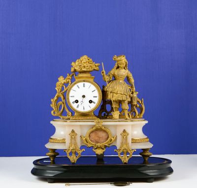 Pendule en régule doré et albâtre figurant une Allégorie du …