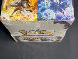 a close up of a box of pokemon cards on a table