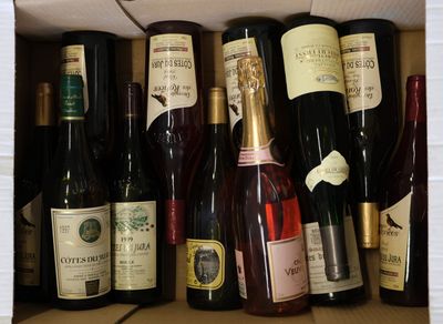 many bottles of wine in a box on the table