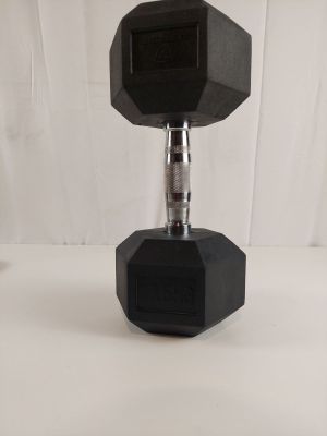 un dumbblek noir sur une surface blanche, avec un fond blanc