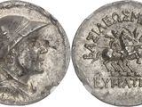 a silver coin with an image of a man on a horse