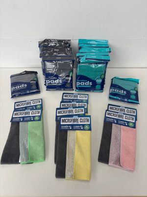 a group of assorted cleaning cloths sitting on top of a counter
