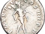a close up of a silver coin with a man on it