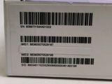 the back of a white box with a barcode on it
