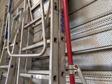 a ladder that is leaning against a wall
