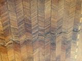 a picture of a wooden floor with a pattern on it