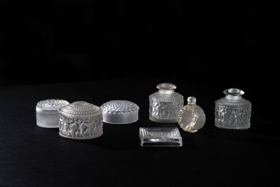 a lot of glass items that are on a table