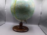 a small globe in a box with lights on it
