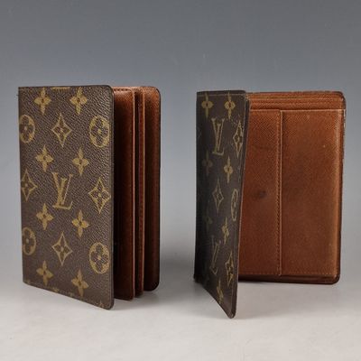 two louis vuitton wallets, one brown and one brown