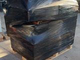 two black boxes stacked on top of each other on a pallet