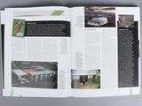 a spread of a magazine with a picture of a soccer stadium