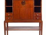 an image of a wooden desk with two shelves and a shelf