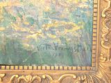 an image of a painting of flowers in a gold frame on a wall