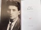 a book with a picture of a man in a suit and tie