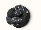 a picture of a black and white brooch with a black and white checkered pattern