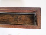 a wooden drawer with a small drawer in it