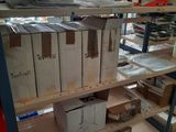 many boxes on the shelves in the room