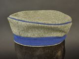an image of a military hat with a blue band on it