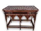 an image of a wooden table with a tile top on a white background