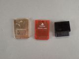 three different types of memory cards sitting on a table